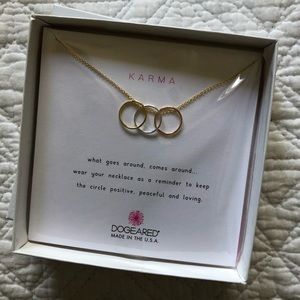 Triple karma ring necklace